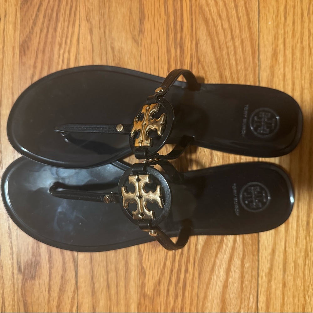 Tory Burch Black Flip Flops with Gold Emblem